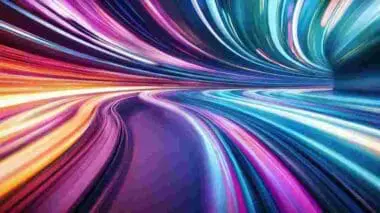 Abstract tunnel of glowing light trails in vibrant red, orange, purple, and blue hues, creating a sense of speed.
