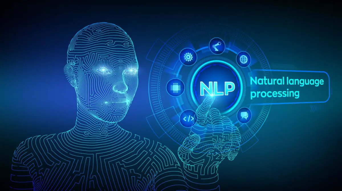 A digital wireframe robot touches a glowing interface labeled NLP for natural language processing on a blue background.