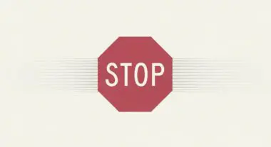 A red stop sign with white text conceptually representing the Noindex Tag for SEO control.