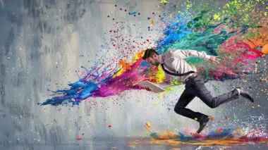 Businessman running with a tablet as a colorful explosion of paint splashes behind him, representing Largest Contentful Paint.