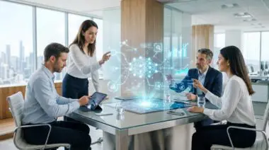 Team discussing business applications of new AI models with holographic data visualizations.