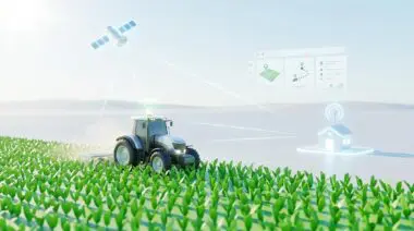 Tractor in field connected via satellite to operations dashboard for real-time automated tracking and optimization.