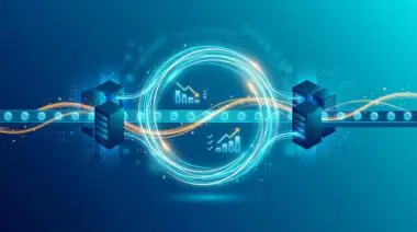 Data loop links server racks, digital display and token conveyor, with cyan and amber streams, showing cheaper, smarter AI.