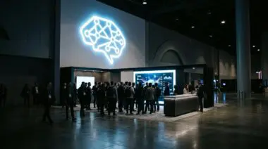 Wide-angle view of a tech exhibition booth with a massive glowing logo and attendees gathered around a screen, representing the breakthrough of the open-source Kimi K3 2.8T-parameter AI model offering low-cost near-frontier performance.